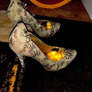 Apple bottom gold shoes